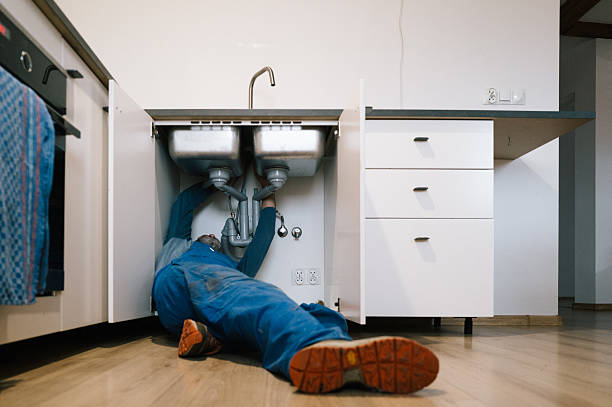Professional Drain Cleaning technician working in Luna Pier, MI